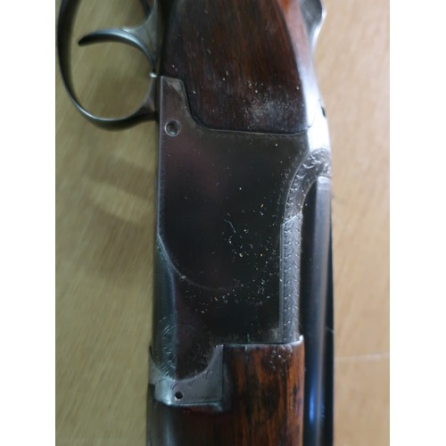 24 - Browning over under 12 bore ejector shotgun with light engraving double trigger with pistol grip sto... 