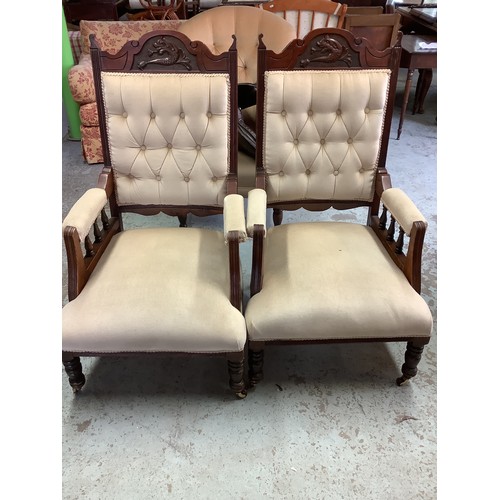 499 - Pair of Edwardian button back cream velvet open armchairs with wood frame and carved top rail, on tu... 