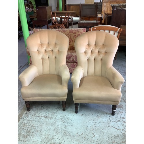 504 - Pair of button back cream velvet Victorian style armchairs, on turned supports (2)