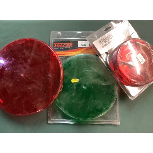 326 - Three coloured lamp lens covers, two red, one green