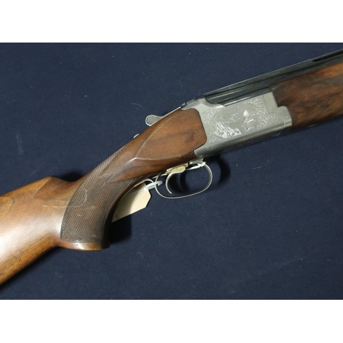 31 - Browning model 325 12 bore single trigger over and under ejector shotgun with 30 inch barrels and 14... 