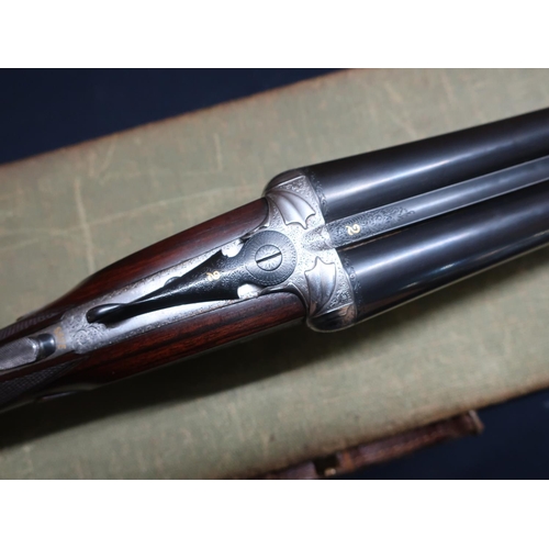 42 - Cased T.Newton 12 bore side by side sidelock ejector shotgun with 26 inch barrels, the rib and top l... 