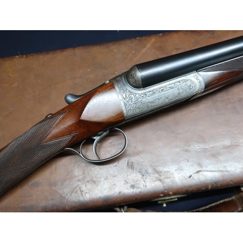 46 - Cased Westley Richards & Co Centenary model 12 bore side by side drop lock round action ejector shot... 