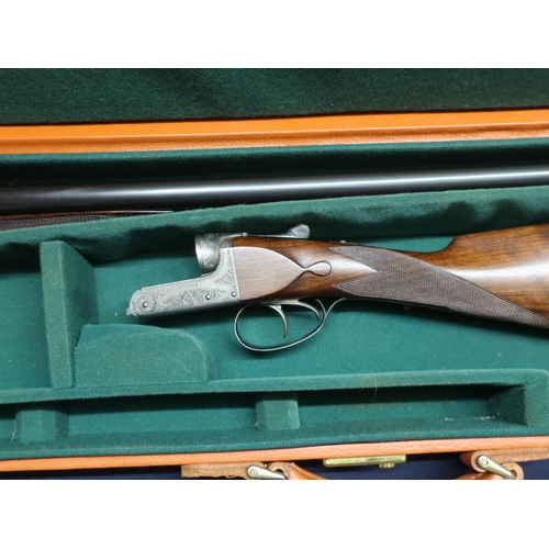 61 - Cased William Evans 12 bore side by side ejector shotgun with 28 inch barrels, choke 1/4 & 1/4, with... 