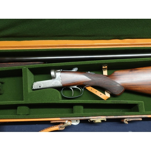 8 - Tan leather cased Gallyon & Sons. 12 bore side by side round action ejector shotgun with 28 inch bar... 