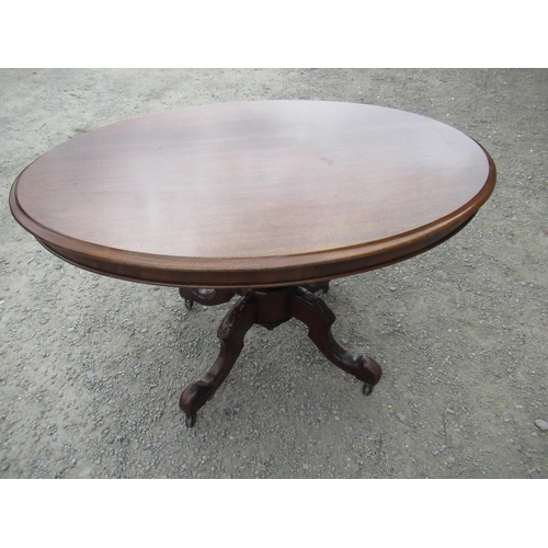 370 - Victorian mahogany oval breakfast table with tilt top on vase turned column and four outsplayed supp... 