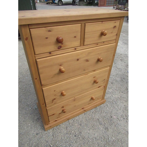 379 - Pine chest of two short and three long drawers with turned wooden  handles on a plinth base W.92cm D... 