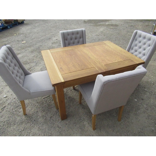 387 - Oak rectangular extending dining table L198cm W91cm H77cm with additional leaf, and a set of four di... 