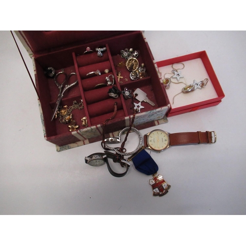 425 - Jewellery box containing costume jewelry including RNLI ladies life boat gild committee members meda... 