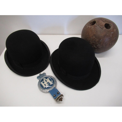 433 - Early bowling ball, Christies bowler hat, another bowler, an RAC badge