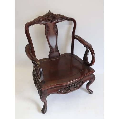 527 - Early 20th C Chinese padouk wood open armchair, with floral carved top rail and vase shaped splat, s... 