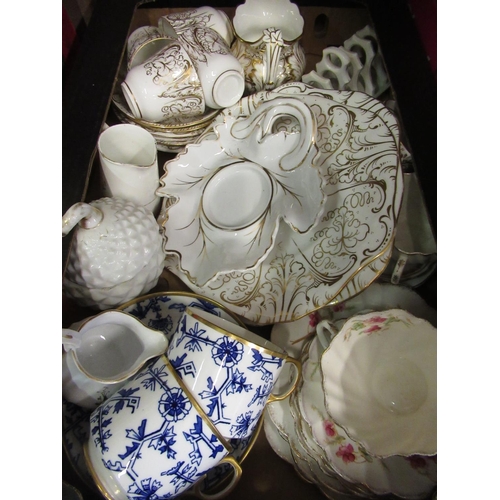 321 - Part tea service with white gilt floral detail comprising 6 cups and saucers, milk jug, two serving ... 