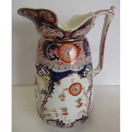 339 - Naples ivory porcelain wash jug with white blue and orange floral and gilt design H34cm