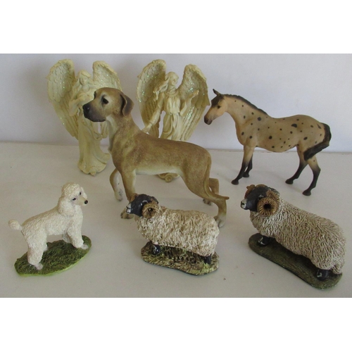 406 - Collection of resin figurines including a Leonardo dog, a horse, a poodle, two sheep and two angels.