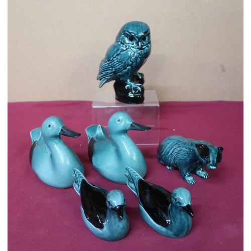 79 - Poole Pottery two duck figurines and two seagull figurines, one figure of an owl and one of a badger... 