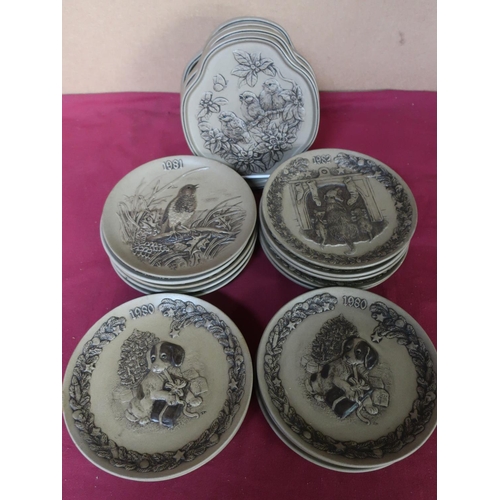 84 - Poole Pottery Christmas decorative plates 1979 - 1984, set of four seasonal decorative plates, and s... 