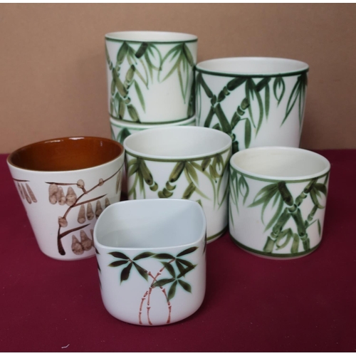 85 - Poole Pottery jardinières with green bamboo hand painted design, another with brown painted design, ... 