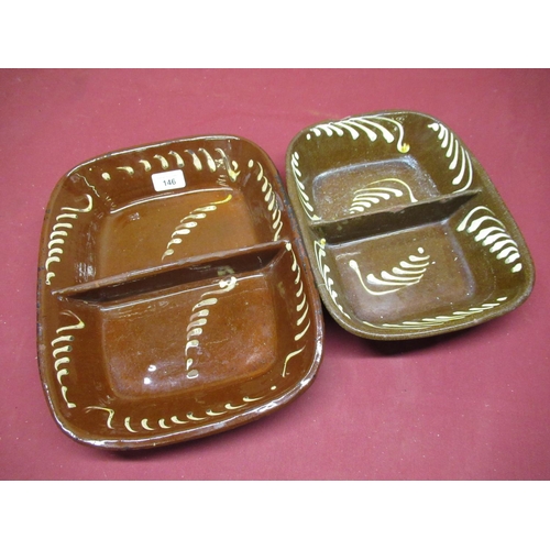 146 - Two 19th C slipware two-section dishes with swirl decoration