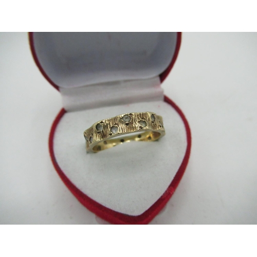 19 - 1970s 9ct gold hallmarked bark effect full hoop spinel eternity ring,
