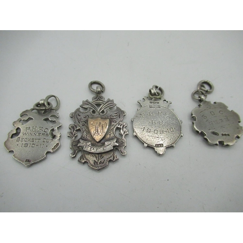 23 - Edw.VII silver hallmarked Ryedale League fob medal, three Geo.V silver Beckett Minor League and othe... 