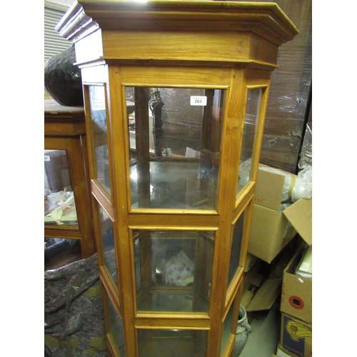 263 - Six-sided glazed three-tier display cabinet enclosed by single door  Diameter.74cm H.175cm