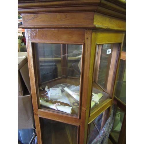 264 - Six-sided glazed display cabinet enclosed by single door, diameter.72cm H.150cm