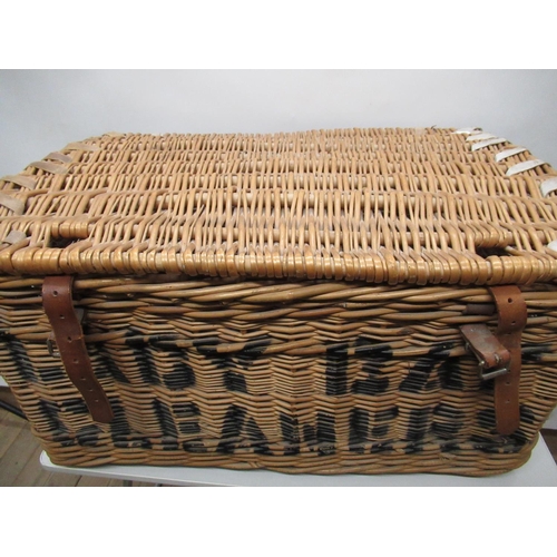 271 - Extremely large wicker picnic style basket with leather hide hinges and banding H.40cm W.78cm D.55cm... 