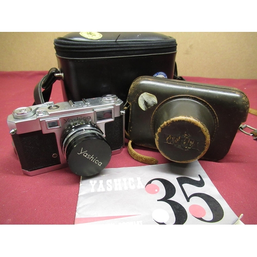 452 - Yashica 35, 35mm range finder camera with a 45M F1.9 lens ever ready case and bag including instruct... 