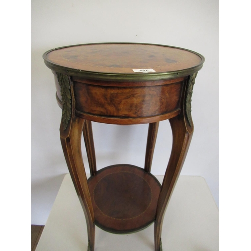 260 - Burr walnut French style two-tier circular occasional table/ with single frieze drawer, with gilt me... 