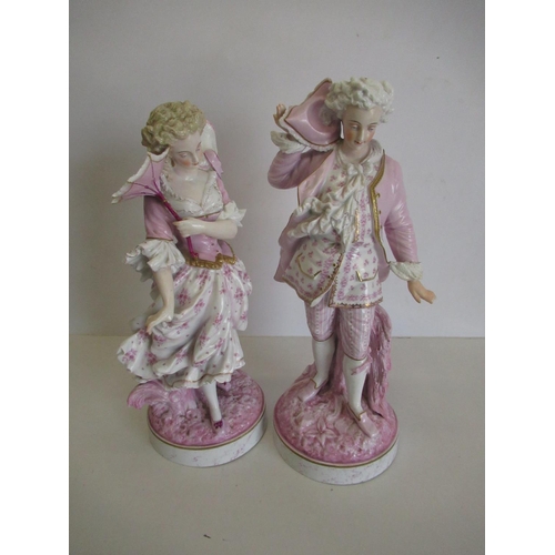 203 - Pair of continental bisque porcelain figures of a lady and gentleman (A/F)