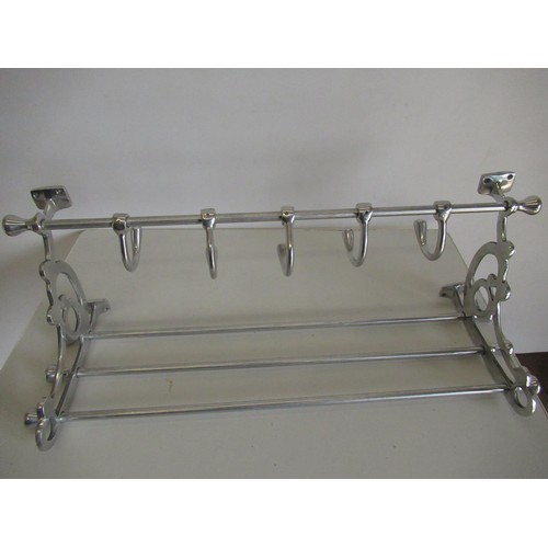 395 - Chrome hat and coat rack, with scroll openwork sides and five hooks, W71cm H30cm