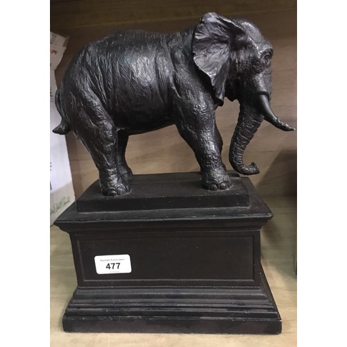 477 - Cast statue of an elephant on a plinth H.33cm