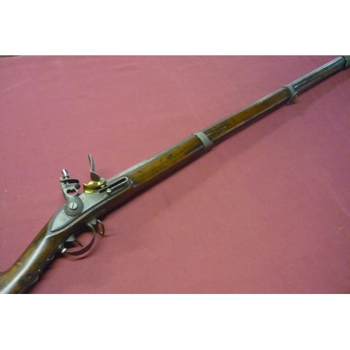 76 - Continental flintlock musket with 40 1/2 inch three banded rifled barrel (pitted), with steel mounts... 