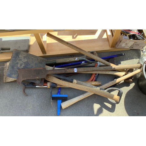 54 - Quantity of handheld garden tools including two sledgehammers, pick axe etc.