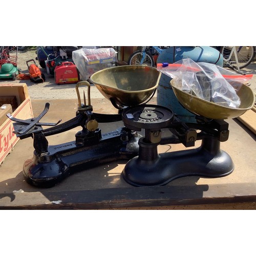 67 - Two pairs of vintage weighing scales with weights