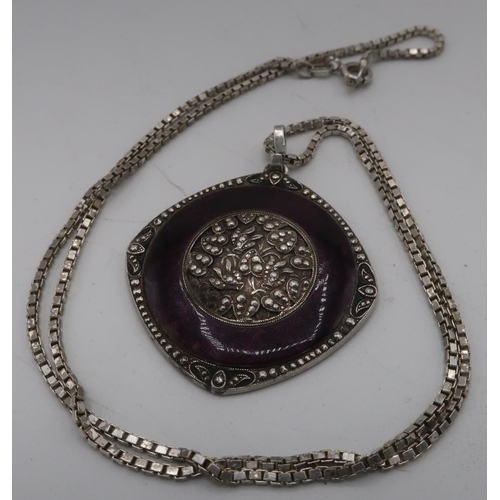 45 - Silver and purple enamel circular pendant with floral central panel, marked 935.000, silver chain st... 