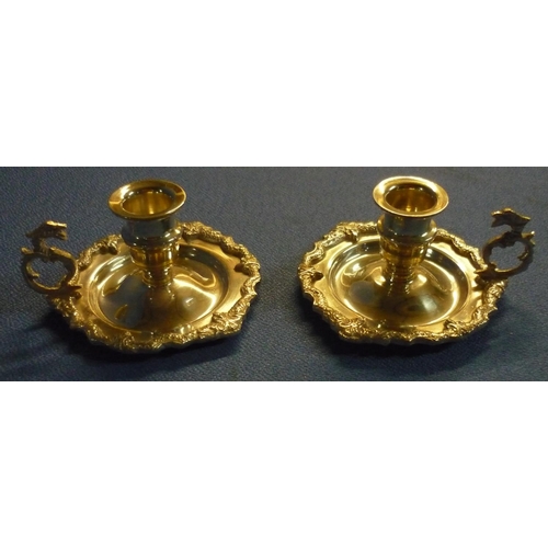 82 - Pair of white metal Eastern chamber sticks with dragon shaped handles c.1965, impressed marks, H5.5c... 