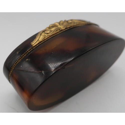 87 - 19th Century gilt metal mounted tortoishell oval patch box, hinged lid inlaid with two colour metal ... 