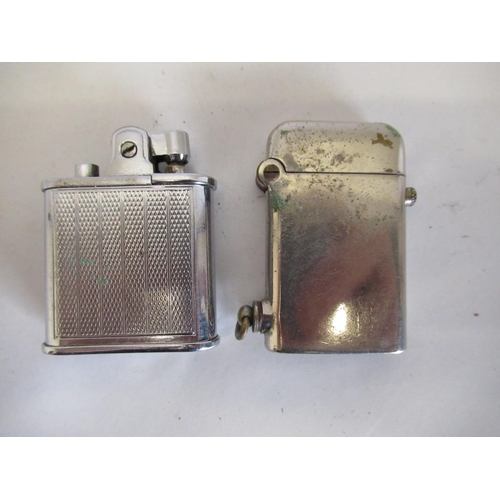 90 - Thornes pantent cigarette lighter and a Rolstar Vintage lighter (2)