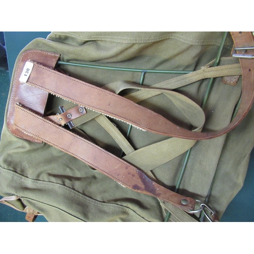 138 - Mid 20th C military style metal framed canvas and leather rucksack with main pouch and three side po... 