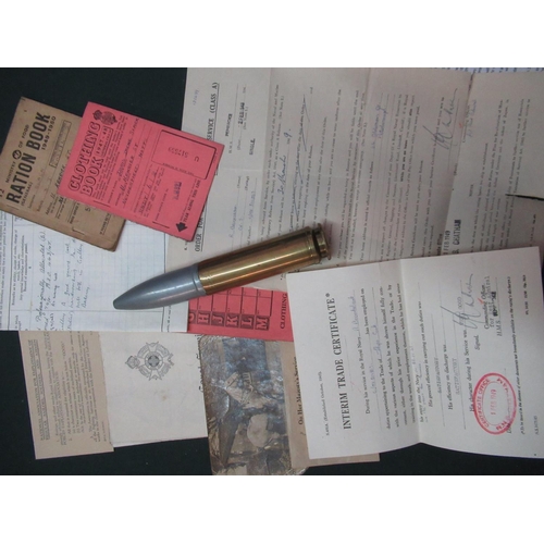 146 - Selection of military paperwork and ephemera including trailing books, ration books inert shell casi... 