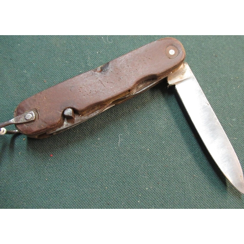 107 - German WWII KL combination pocket knife with lanyard ring and multiple blades