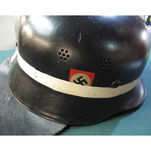 12 - WWII period German fire brigade helmet with leather liner chinstrap and leather neck guard