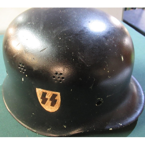 15 - German WWII period steel helmet with later hand painted SS decals (lacking liner and chinstrap)