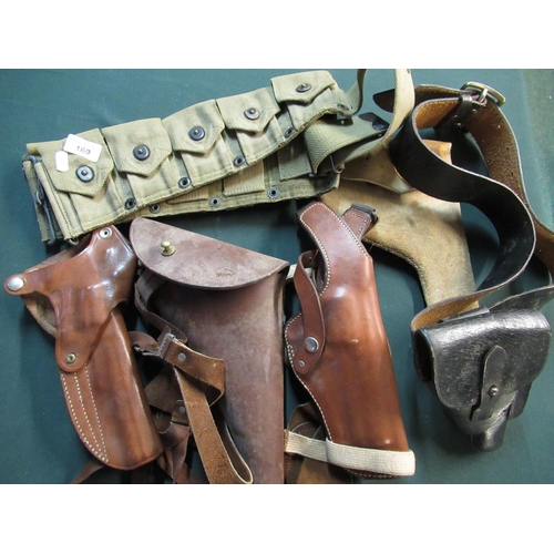 169 - Selection of various leather and other pistol holsters, shoulder and belt including: Sam Brown style... 