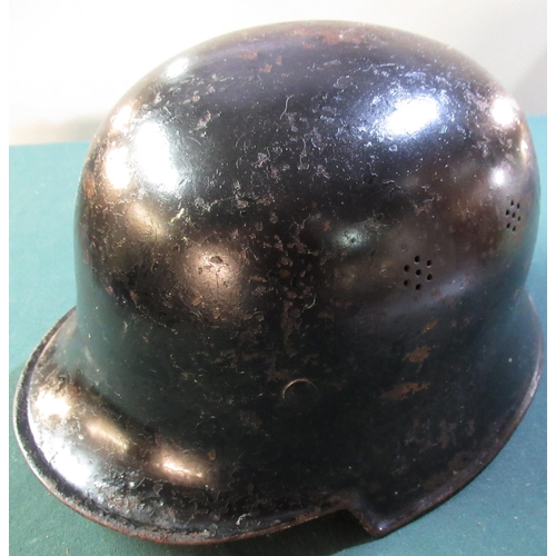19 - WWII period German black rolled edge square dipped shape Police steel helmet with liner