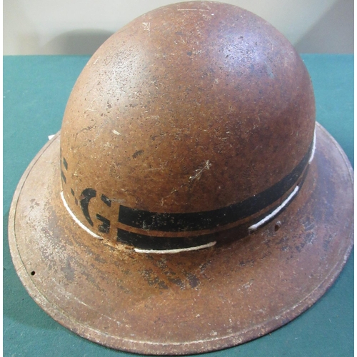27 - British WWII period F.G (Fire Guard civilian) steel helmet with liner