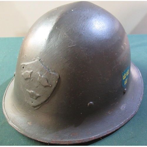 29 - WWII period 1928 patent Swedish steel helmet with liner and straps, with traces of painted over thre... 