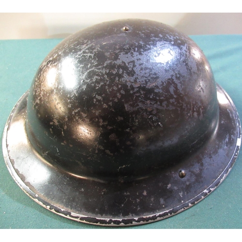 47 - British WWII period civil defence steel helmet with liner and chinstrap
