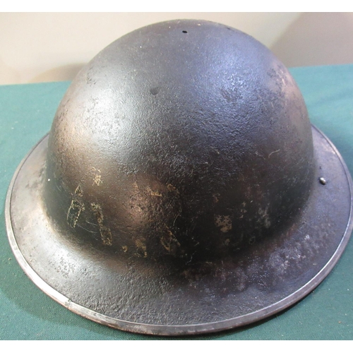 48 - British WWII period black painted civil defence helmet with faint ARP to the front (lacking liner)
